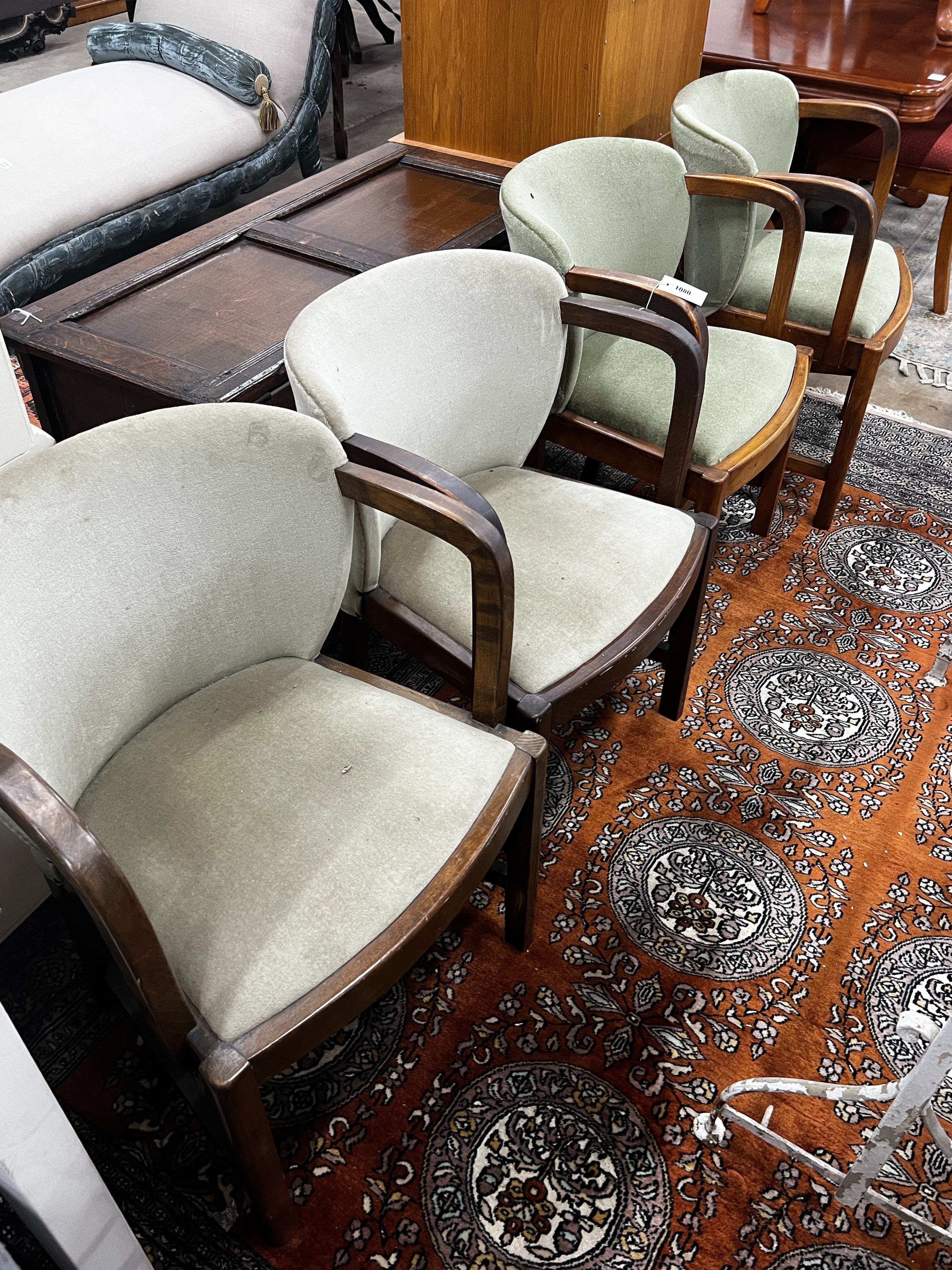 A set of four Art Deco style walnut upholstered tub elbow chairs, width 55cm, depth 54cm, height 78cm